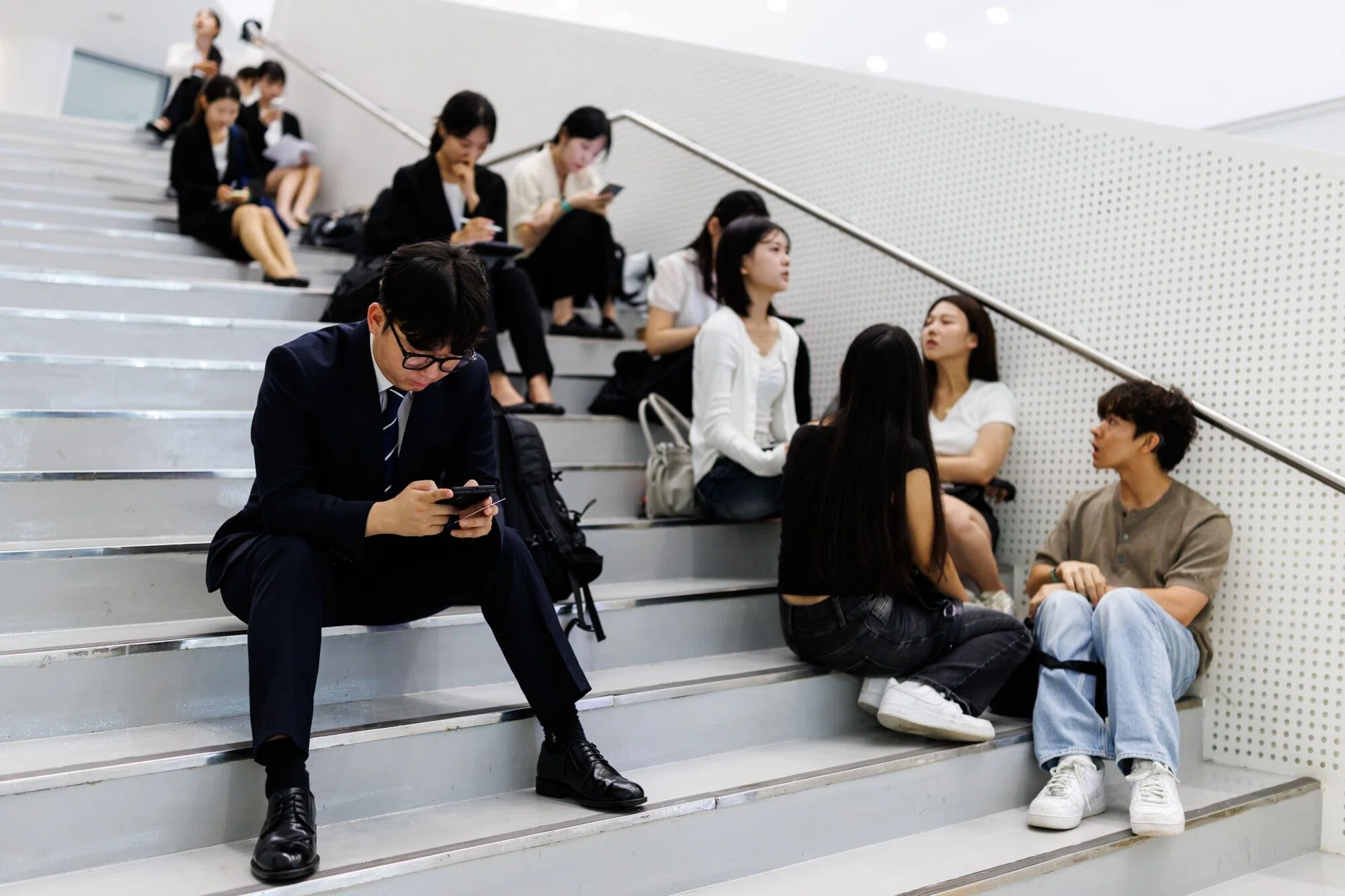 Picture-perfect AI resumes push firms back to tests, referrals