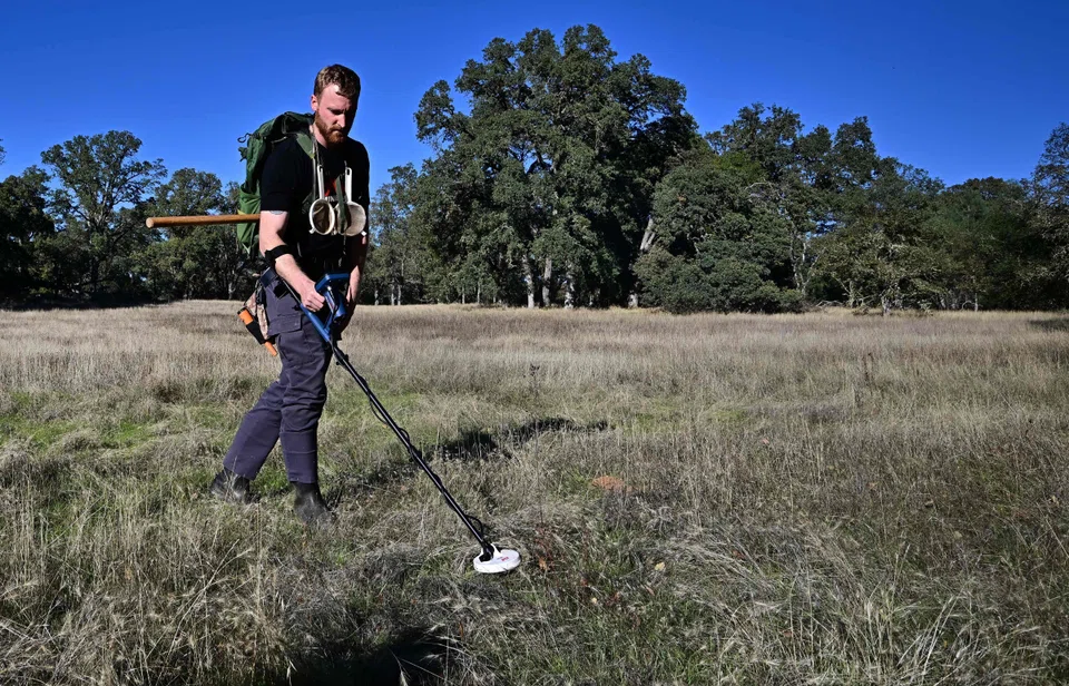 Cody Blanchard of Heritage Gold Rush with his metal detector in El Dorado County; he is hoping his Heritage Gold Rush can serve the niche market – and help him turn a hobby into a thriving business.