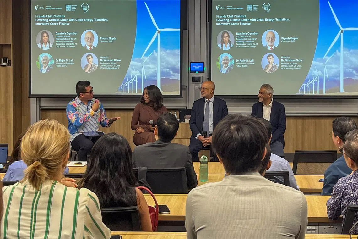 From left: Winston Chow, professor of urban climate and co-chair of the United Nations' (UN) Intergovernmental Panel on Climate Change Working Group II; Damilola Ogunbiyi, special representative of the UN secretary-general for Sustainable Energy for All; Piyush Gupta, SMU chairman; and Dr Rajiv Lall, professorial research fellow at Singapore Green Finance Centre. They were speaking at a panel organised by SMU on Aug 26.