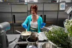 Annie Clemmons, owner of online bakery Chapman's DC, bakes an eggless pavlova in the ghost kitchen she uses for her business in Silver Spring, Maryland.