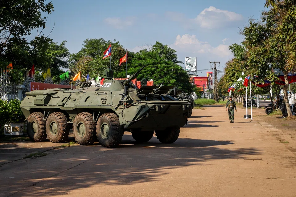 Security personnel and tanks dot the streets of Vientiane. Police presence in Laos' capital is heightened.