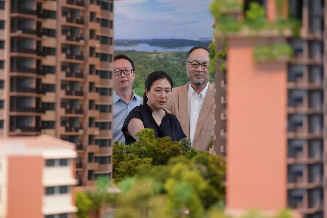(From left) China Construction (South Pacific) Development Co deputy project director Wu Fei, GuocoLand residential development director Jois Phoo and ADDP Architects senior associate partner Tang Kok Thye led their teams in using CORENET X for the Springleaf Residence project.