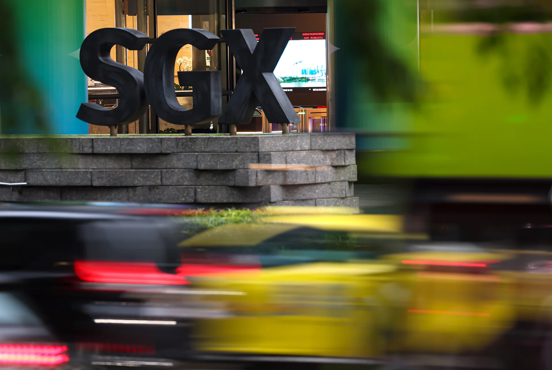 Singapore shares fall as local banks end mixed; STI down 0.1%