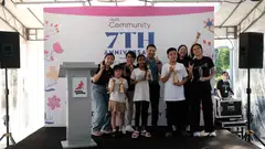 Minister for National Development of Singapore Desmond Lee (centre) with Glyph beneficiaries and volunteers as they celebrate the charity's seventh anniversary.