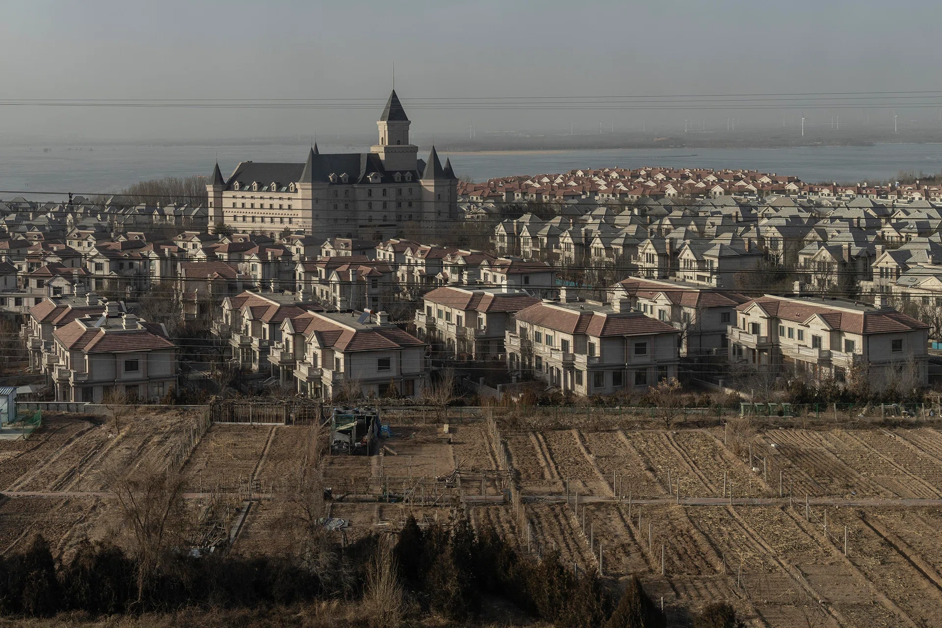 China new home prices decline at slower pace in June amid improvement in key cities