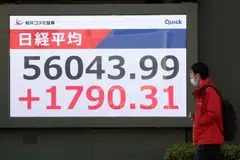 The Nikkei 225 Stock Average displayed outside a securities firm in Tokyo, Japan, Feb 9, 2026. 