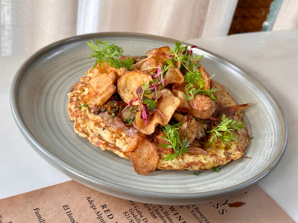 Broken omelette is a take on Spanish omelette with caramelised onions and sauteed mushrooms.