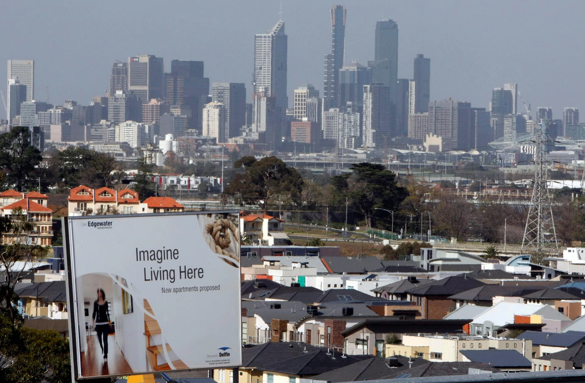 Australia to cap high debt-to-income home loans from February to curb housing risks