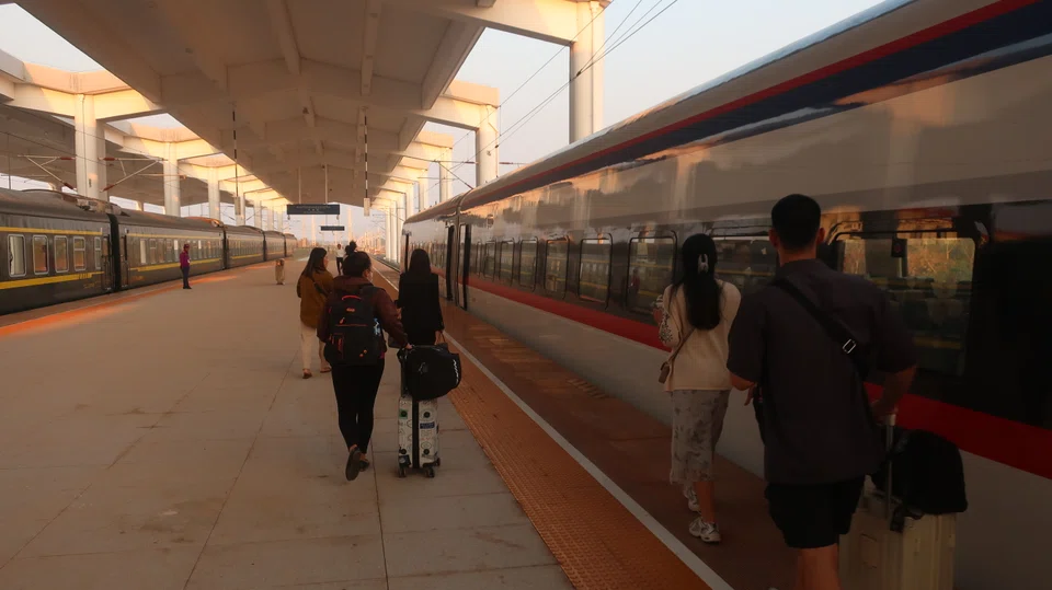 Passengers preparing to board the Laos-China Railway in Luang Prabang, Laos. The 420-km link was built at a cost of US$6 billion.