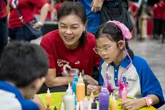 Singtel's group chief people and sustainability officer Aileen Tan says that the carnival also helps employees understand vulnerable communities better. 