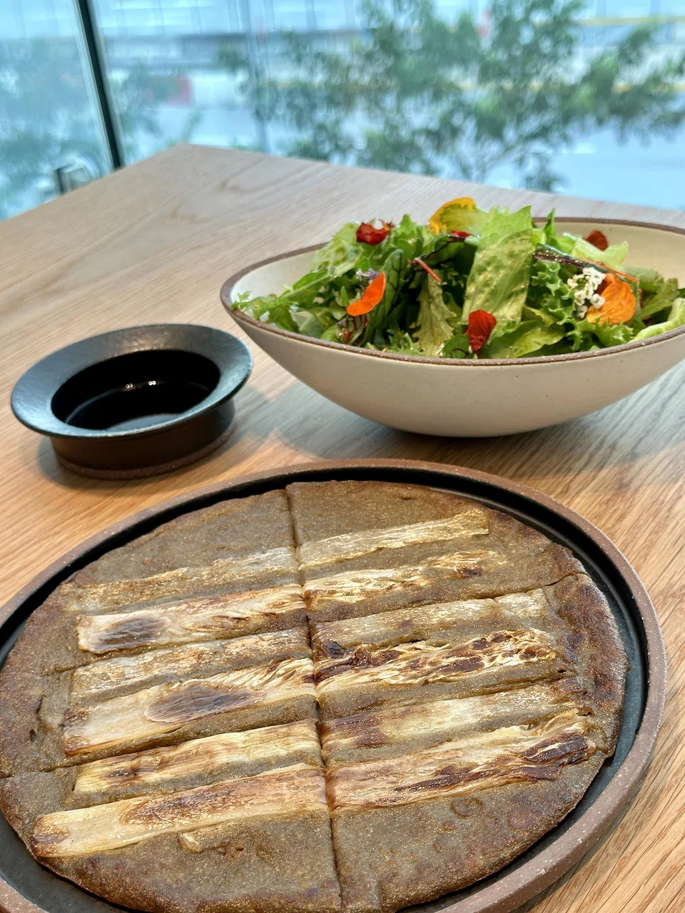 Buckwheat pancake and salad from leaves harvested from the smart farm.