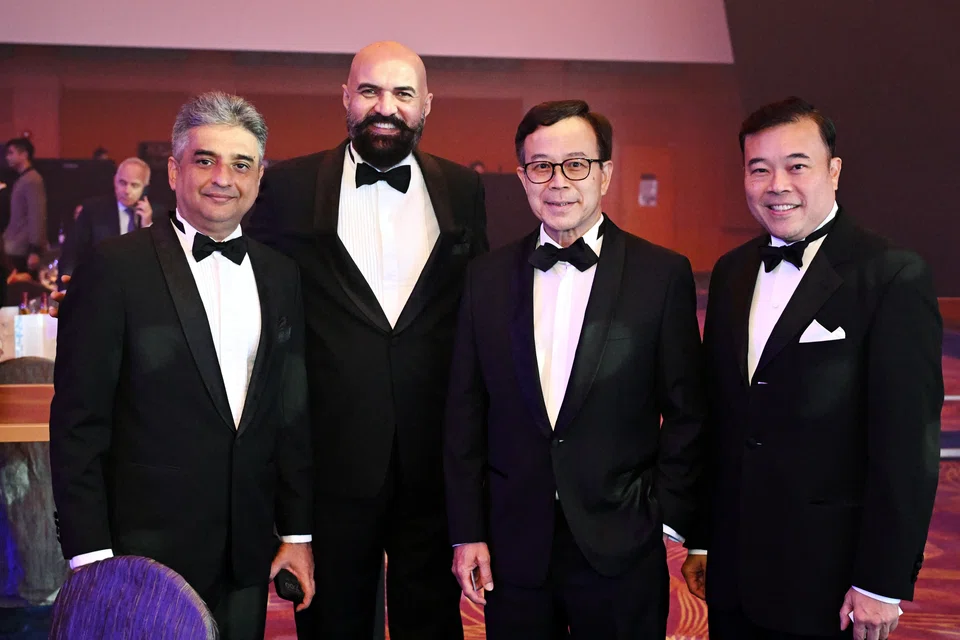 From left: Interlock Group’s CEO Sanjiv Sharma; its COO, Kevin Singh; with Tri-Star Industries’ MD Harold Lim and
group CEO Perry Lim.