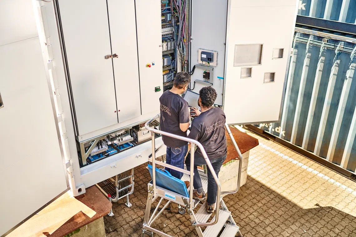 Amperesand engineers perform testing on its medium-voltage solid-state transformer power solution. The platform cuts installation labour needs by half and accelerates time to power by 10 times.