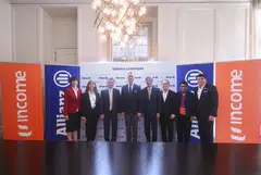 From left: NTUC Enterprise CEO Adeline Sum; Allianz board member Renate Wagner; Income's board chair Ronald Ong; Allianz CEO Oliver Baete; NTUC Enterprise Co-operative and Temasek chair Lim Boon Heng; NTUC Enterprise's deputy chair Kee Teck Koon; Allianz Asia Pacific's regional CEO Anusha Thavarajah; and Income CEO Andrew Yeo.