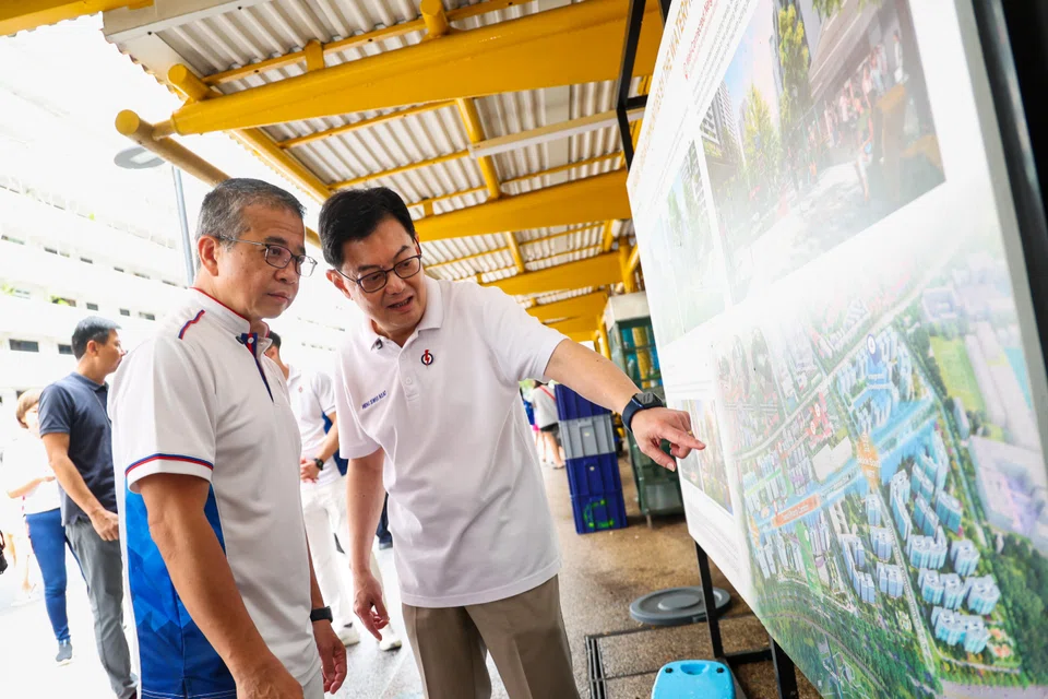 Minister for Culture, Community and Youth Edwin Tong (left) was accompanied by East Coast GRC's anchor minister Deputy Prime Minister Heng Swee Keat during his first public walkabout in the constituency. 