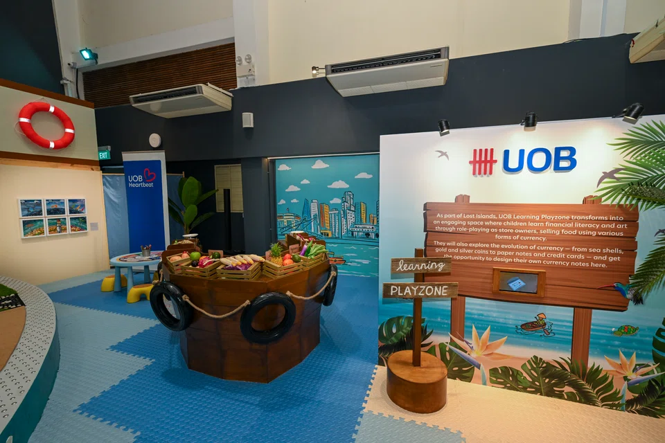 At the UOB Learning Playzone, children can pick up the basics of trade by role-playing as buyers and sellers at the bumboat "marketplace".
