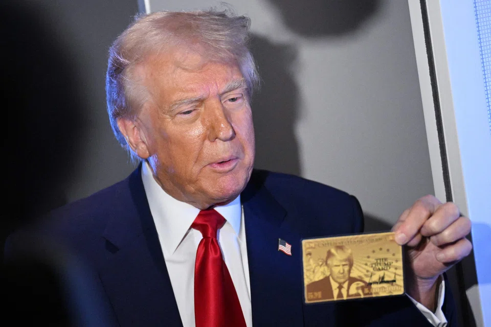 Holding a prototype that bore his face and an inscription “The Trump Card”, President Trump said that the special visa would probably be available “in less than two weeks”.
