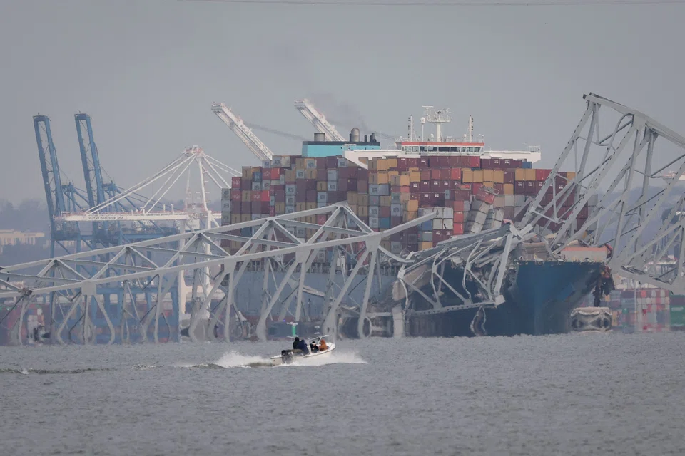 The Francis Scott Key Bridge in Baltimore partially collapses after a container ship runs into it.
