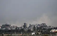Smoke rises during an Israeli military operation in Al Nuseirat refugee camp, central Gaza Strip, April 17, 2024. All three major rating firms have put out warnings on Israel’s credit score since the onset of the war with Hamas. 