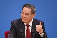 Li thanked the foreign representatives in the audience for the support they’d offered over the years and urged them to “take a long-term view” amid economic challenges. 