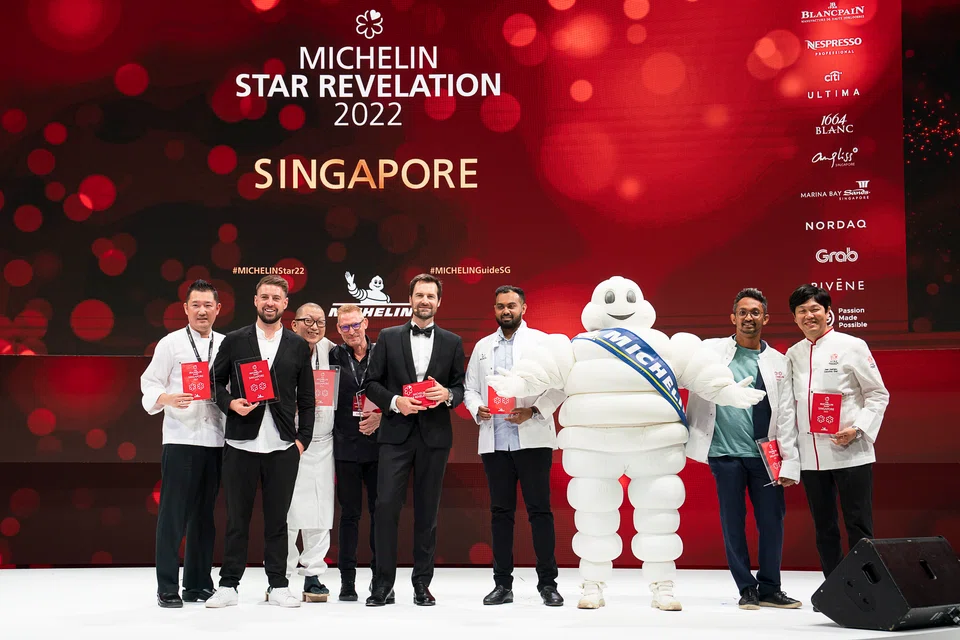 Mano Thevar (4th from right) and Rishi Naleendra (2nd from right) with fellow 2-Michelin star chefs