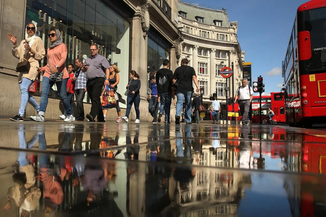 Retail sales in the UK dropped more than expected in October as consumers reined in spending ahead of the Budget.