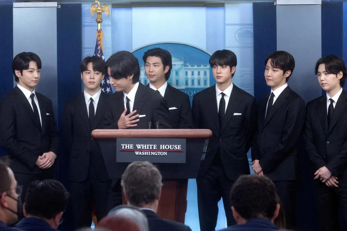 Members of the K-Pop band BTS makes statements against anti-Asian hate crimes and for inclusion and representation during the daily briefing at the White House in Washington, May 31, 2022. 