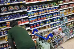 The British Retail Consortium says that annual shop price inflation fell to 5.2% in October, from 6.2% in September.
