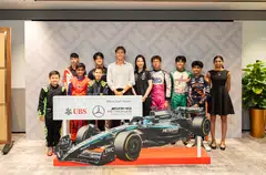 George Russell (in white) of Mercedes together with UBS Singapore country head Young Jin Yee (fifth from right) and some of Singapore's young aspiring F1 drivers. 