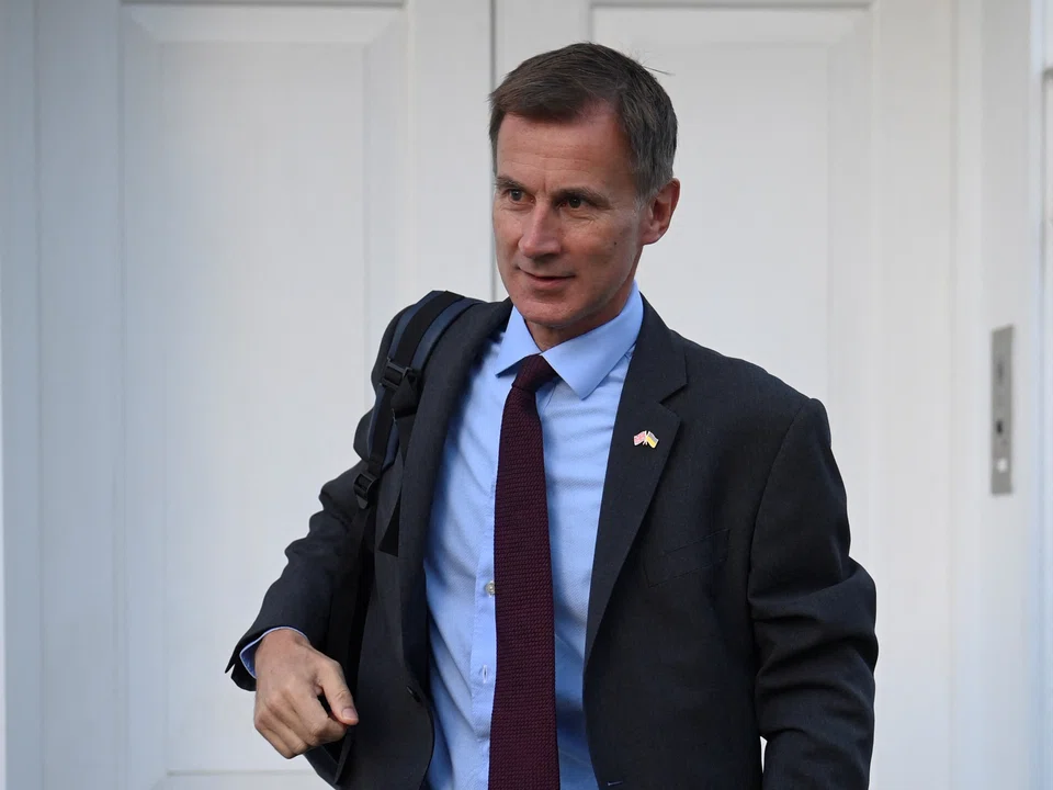 Britain's Chancellor of the Exchequer Jeremy Hunt ripped up virtually all the libertarian growth policies of Prime Minister Liz Truss in his presentation to a rowdy parliament on Oct 17, 2022. 