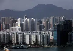 Hong Kong's property slump has restrained growth even as the Asian financial hub makes progress in other areas, such as reclaiming the world’s top spot for stock listings and further expanding its bond market.