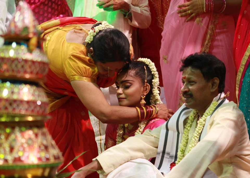 FILE PHOTO: India imported 101 tonnes of gold in May, compared to 13 tonnes a year earlier. Gold is an essential part of the bride’s dowry in India, and also a popular gift from family and guests at weddings. Weddings postponed last year because of Covid-19 curbs are being held this year. 