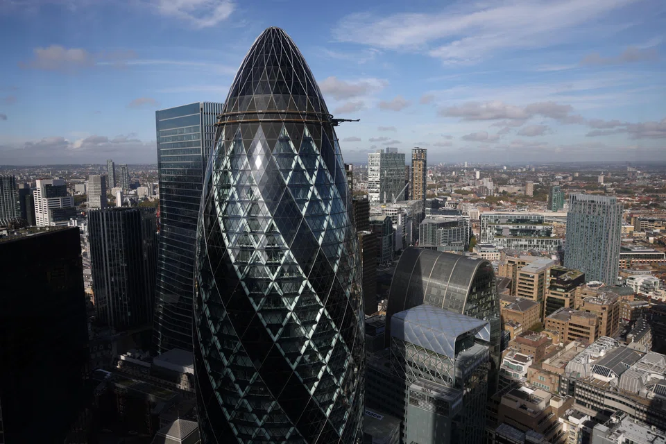 A view of 30 St Mary Axe, better known as  'The Gherkin', in London.