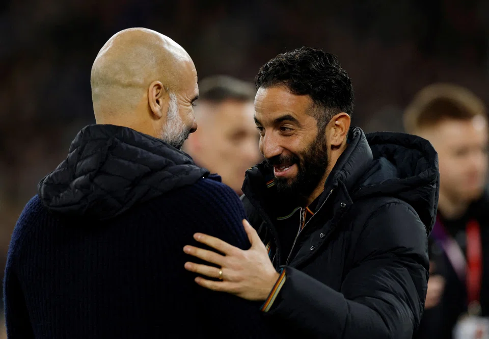 Manchester City manager Pep Guardiola (left) with Manchester United manager Ruben Amorim before their teams played each other at the Etihad Stadium last December. United won 2-1.