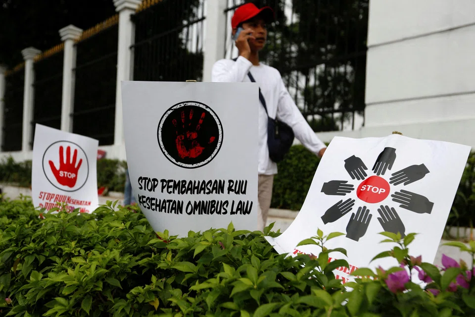 Indonesia's parliament approves the revised healthcare laws despite medical workers demanding further public consultation on the reforms.