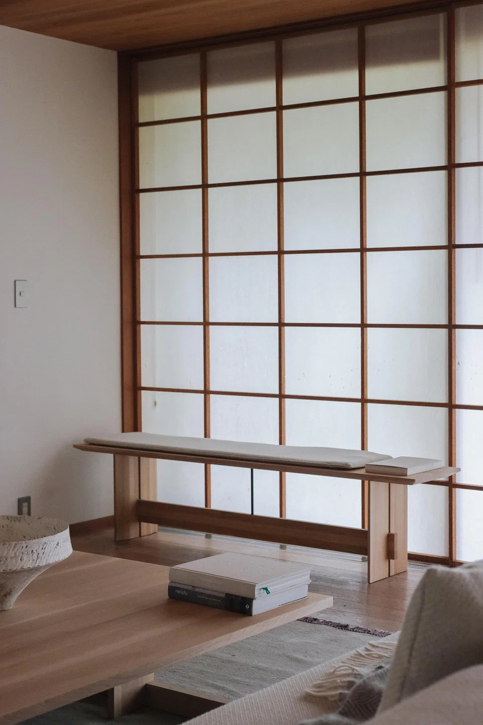 In Yugawara House, shoji sliding screens soften sunlight.