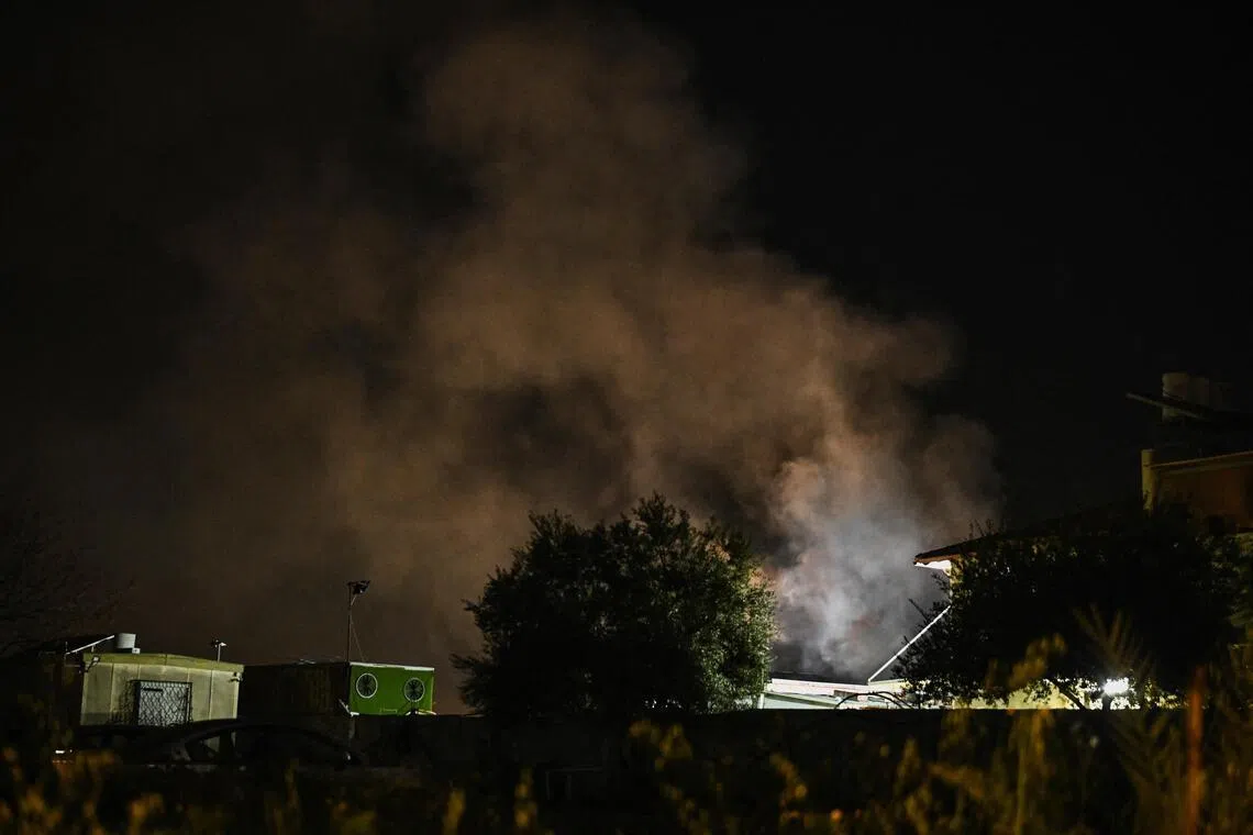 Smoke billowing in central Israel from reported missiles launched from Iran on Friday (Mar 6). Geopolitical shocks in war and peacetime tend to lead to lasting fiscal expansion.  