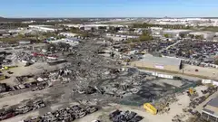 A drone view of the crash site next to a runway at the Muhammad Ali International Airport following the crash of a UPS cargo plane in Louisville, Kentucky, Nov 7, 2025.    