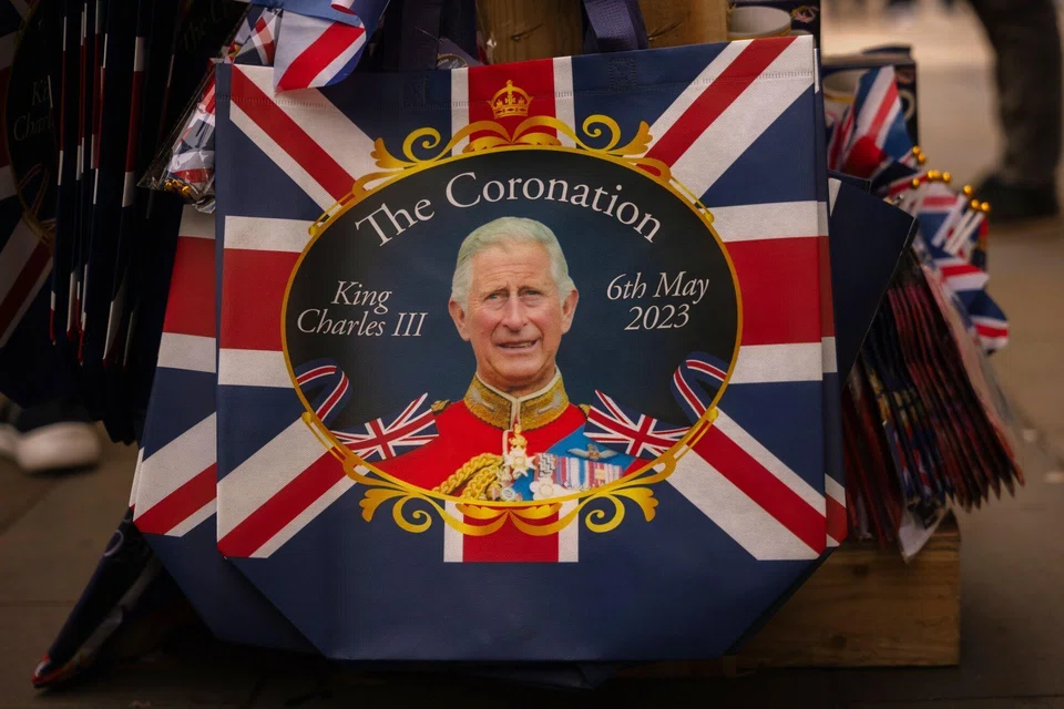 Royal and coronation-related merchandise on sale at a street stall in Picadilly Circus in London, UK, on Sunday, April 30, 2023. The coronation is a religious event which celebrates the start of King Charles III’s reign. 