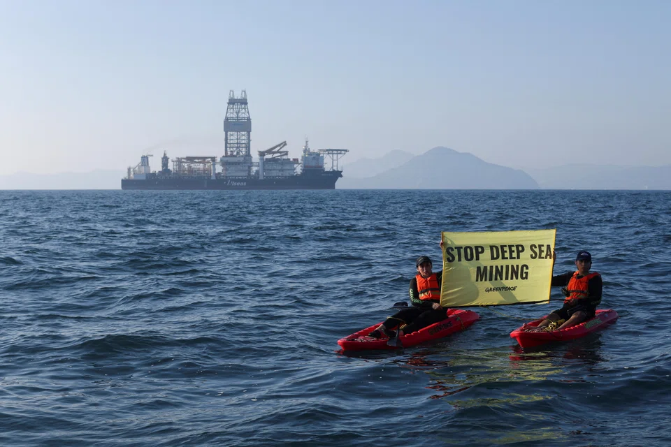 Greenpeace activists from New Zealand and Mexico confront the deep sea mining vessel Hidden Gem, commissioned by Canadian miner TMC, as it returns to port from eight weeks of test mining in the CCZ between Mexico and Hawaii, on Nov 16, 2022. 
