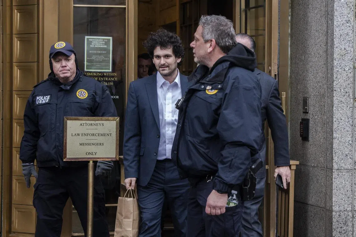 Sam Bankman-Fried, who was convicted of stealing US$8 billion from customers of his international crypto exchange, FTX, leaving a federal district court in New York, December 2022. 