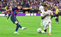 Barcelona's Robert Lewandowski (left) in action against Real Madrid when the 2 Spanish teams last met in July 2022 in Las Vegas.