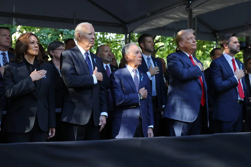 (From left) Democratic presidential nominee, US Vice-President Kamala Harris, US President Joe Biden, former New York City mayor Michael Bloomberg, former US President Donald Trump and Republican vice-presidential nominee, US Senator JD Vance attend a annual 9/11 commemoration ceremony in New York City, US, Sept 11, 2024.