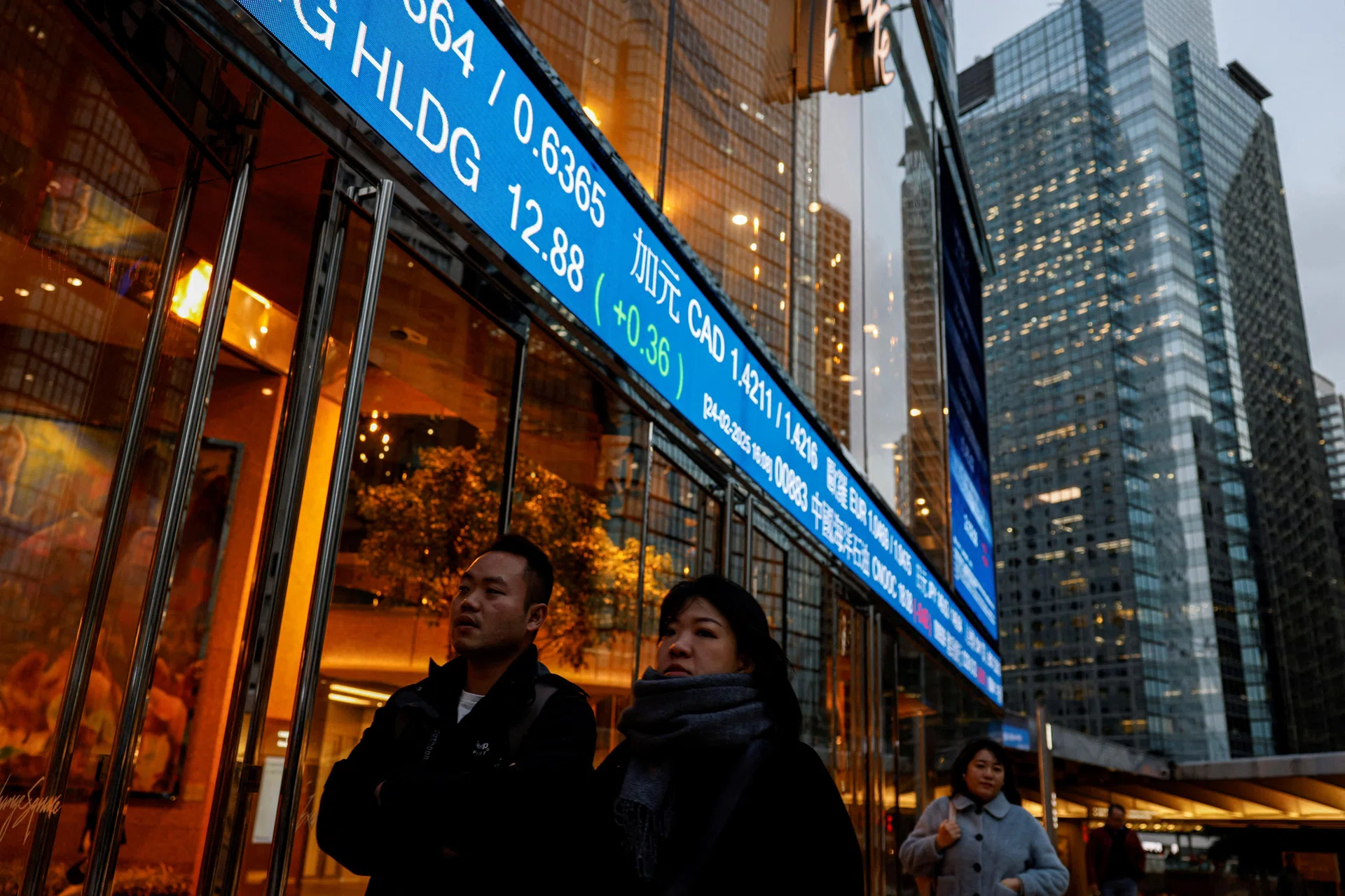 Hong Kong stocks drop on trade war anxiety, China inches higher - The ...