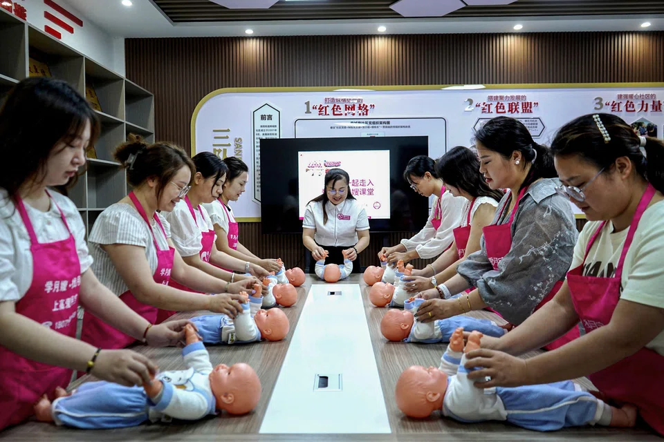 Women at an antenatal course in Yichun, China, Aug 21, 2024. China is rapidly running out of mothers. The number of women of reproductive age, defined by the United Nations as 15-to-49, is set to drop by more than two-thirds to under 100 million by the end of the century.