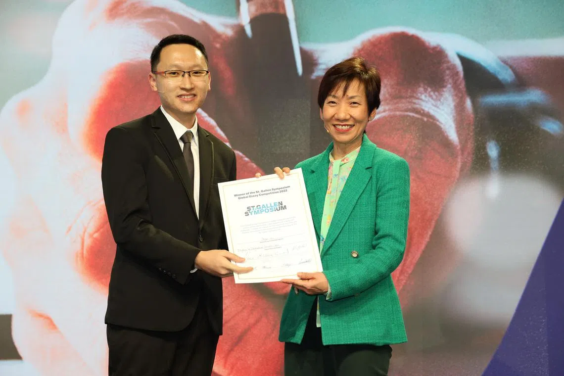 Bryan Tan, one of the three winners of the St Gallen Symposium’s annual global essay competition, with Grace Fu.