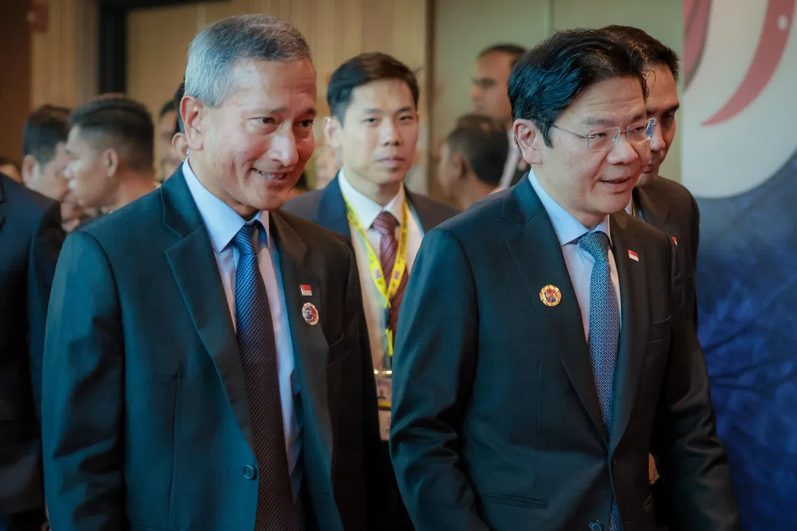 PM Wong (right) with Minister for Foreign Affairs Vivian Balakrishnan at the Asean Summit in Kuala Lumpur  on Oct 26. PM Wong highlighted Asean’s efforts to build out the Asean Power Grid, and welcomed American companies to help with the process. 
