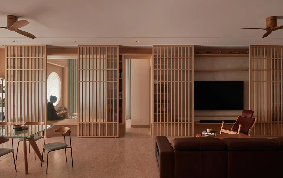 Sliding screens hide the television when it is not in use. 