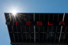 A newly built Tesla Supercharger station in Lost Hills, California. Tesla says the station is not connected to the electrical grid, features 84 chargers that are all fully solar-powered by solar and batteries. 