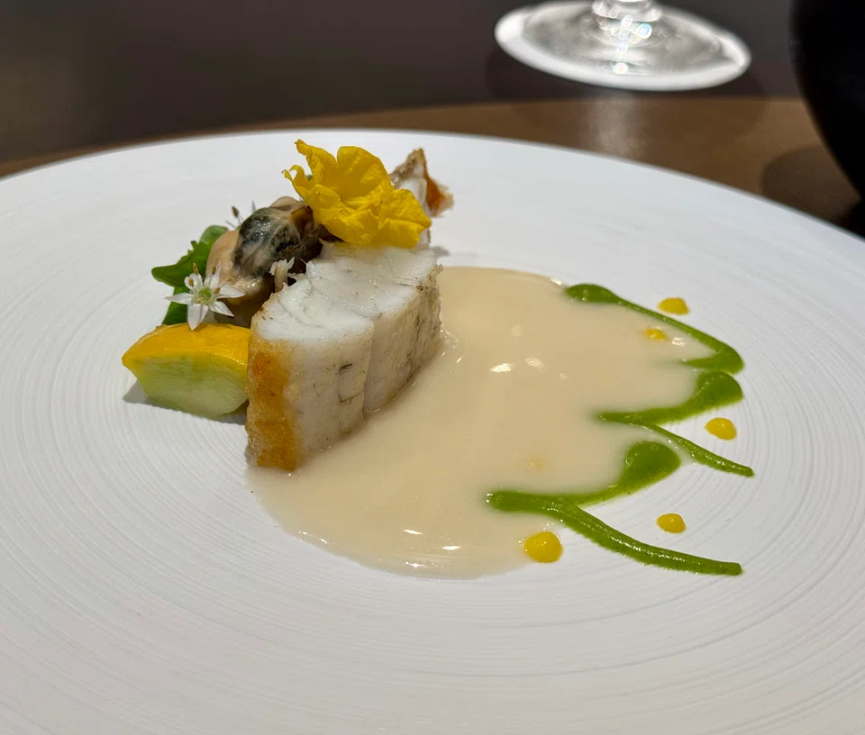 A beurre blanc sauce with mussels and raw Japanese squid gives mild-mannered sea bass some character.